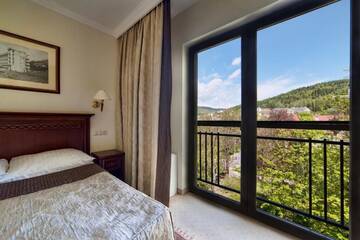 Фото номера Двухместный номер с 1 кроватью Отель Hotel Prezydent Krynica Zdrój г. Крыница-Здруй 8