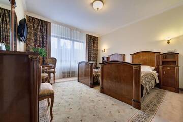 Фото номера Двухместный номер с 2 отдельными кроватями Отель Hotel Prezydent Krynica Zdrój г. Крыница-Здруй 2